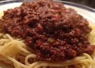 Bolognese Sauce 250gm fresh beef mince 1 large white or red onion 1 garlic clove 400gms canned chopped tomatoes 1 beef stock cube 2 x 15ml (tbsp.