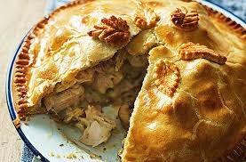 Easy Chicken Pie 2 cooked chicken breasts or 200g of left-over cooked chicken 1 /550g packet of readymade puff pastry 2 handfuls of frozen peas/carrots or mixture Chicken or vegetable stock cube &