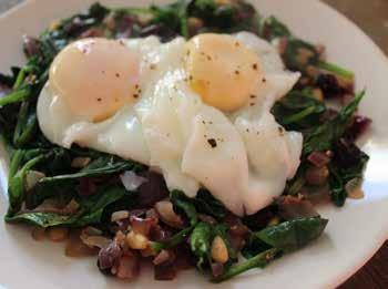 Poached eggs Spanish style 1 tsp ghee or coconut oil 60g red onion, finely chopped 1 clove garlic, finely chopped 7g pine nuts pinch of salt and pepper 1/2 tsp ground cinnamon a large handful of