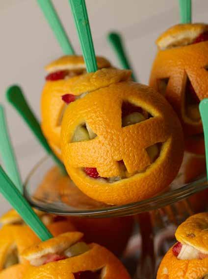 snacko -lantern Our healthy Jacks sport spoon stems for scooping up the refreshing fruit salad filling.