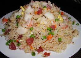 Fried Rice **Cơm Chien-Fried Rice $11 $1 MORE ON DISHES THAT INCLUDE GRILLED SHRIMP A combination of eggs, mixed vegetables, and stir-fried Jasmine Rice with your choice of Meat or Seafood. F8.