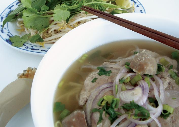 Combination with steak meatballs tripe brisket & tendon STEAK & MEATBALL PHO OTHER RICE NOODLE soups Bun Bo Hue A Vietnamese spicy soup with thick round rice noodles slices of pork beef red onion