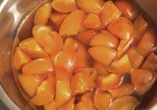 Place 16 segments and 100ml (3 ½ fl oz) of the plum wine and vanilla into a vacuum bag, vacuum and seal and place into the saucepan of water.