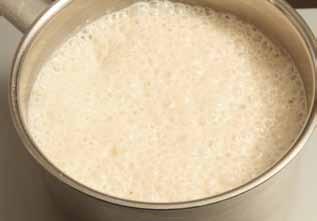 24 240ml (8fl oz/1 cup) milk 80g (5 6 tablespoons/3oz) fresh yeast 920g (2lb/7 cups) plain (all-purpose) flour, sifted,