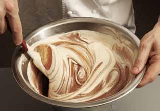 4 In a separate bowl, whisk the cream until it reaches the ribbon stage (see page 000) and then