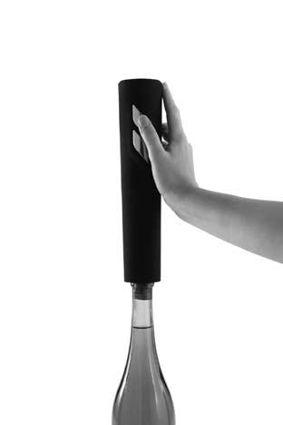 If you hold the Wine Opener at an angle to the bottle it will not remove the cork properly. (Figure 3) 2 Hold the Wine Opener firmly and depress the lower part of the switch.