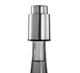 Press down on the center section to remove excess air from the bottle. This helps to reduce oxidation and preserve wine longer than standard stoppers.