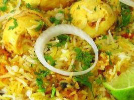 65 Biryani Basmati rice slow cooked with aromatic spices and topped with
