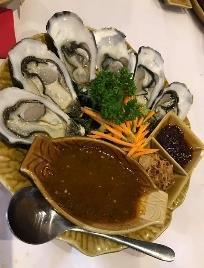 Somsak Thai Special Oysters Entree Natural oysters served with spicy sauce of coriander root,