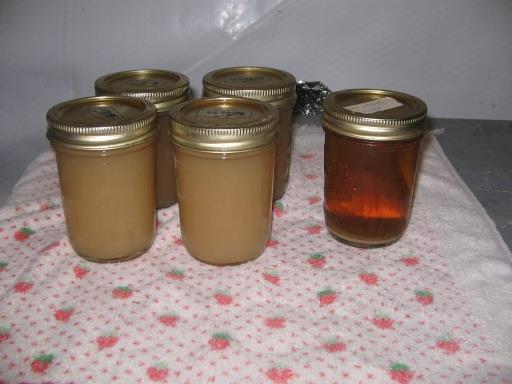 Carefully fill the pint jars from the large without stirring up