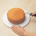 Do this over the entire top circumference of the cake so that you can remove the crown. Try to keep the knife as level as possible while you cut.