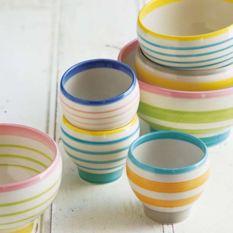 E-TONE Relaxing, Hand-painted Accents for Your Table The series of white porcelain bowls with colorful lines.