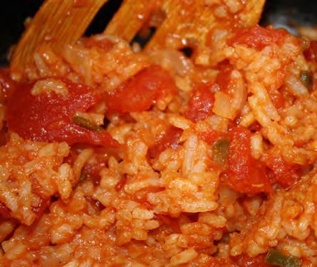 Spanish Rice Serves: 8 Serving Size: ¾ cup 1 tablespoon canola oil 1 small onion*, chopped (~1/2 cup) ½ medium green pepper*, chopped (~ 1 /2 cup) ½ pound lean ground beef or turkey ½ teaspoon black