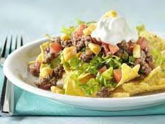 Main Dish Taco Salad Serves: 5 Serving Size: 2 cups ½ pound 90% lean ground beef or turkey 1/8 teaspoon chili powder 1/8 teaspoon garlic powder 1/8 teaspoon salt ½ head of romaine lettuce*, chopped