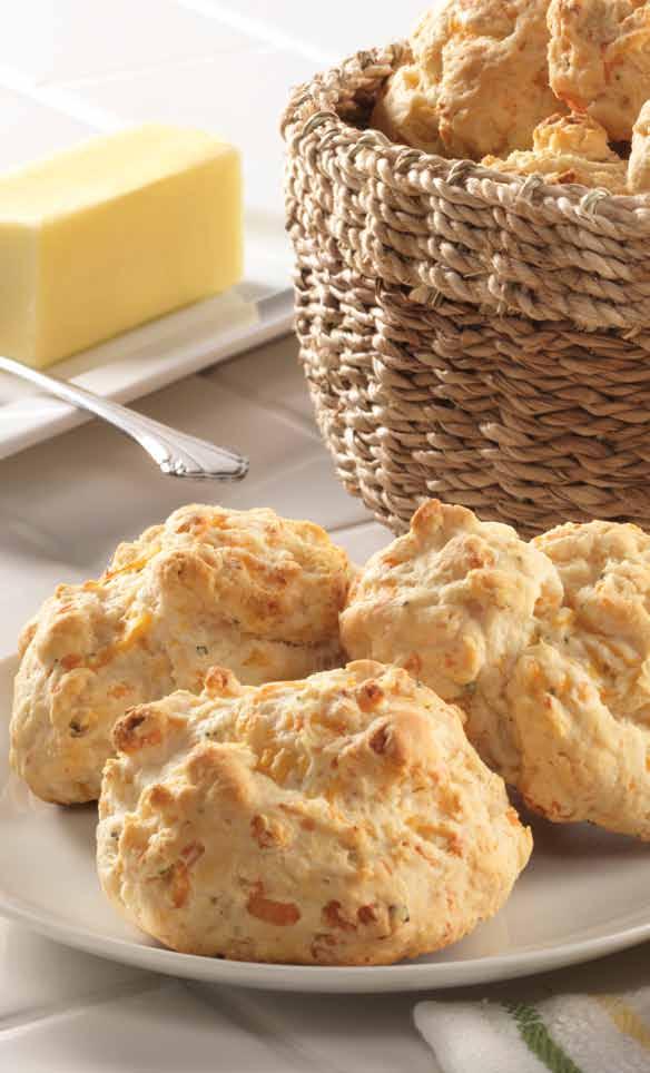 parmesan, and cheddar cheeses combine for this delightfully delicious drop-style biscuit.