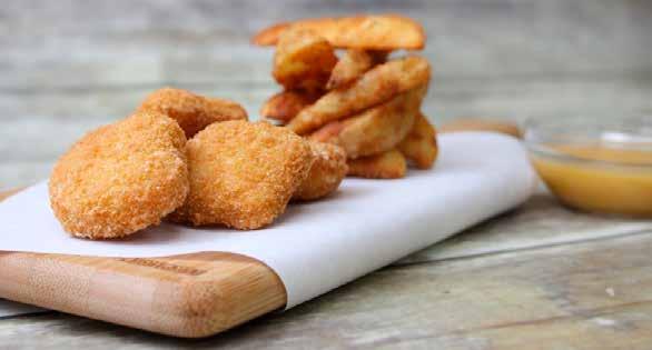 CHICKEN NUGGETS WITH HONEY MUSTARD SAUCE 7 2 slices white or whole wheat bread made into breadcrumbs 9 oz. chicken breast chopped into pieces 1 tsp. garlic puree 1 tsp. ketchup 2 eggs beaten 1 tbsp.
