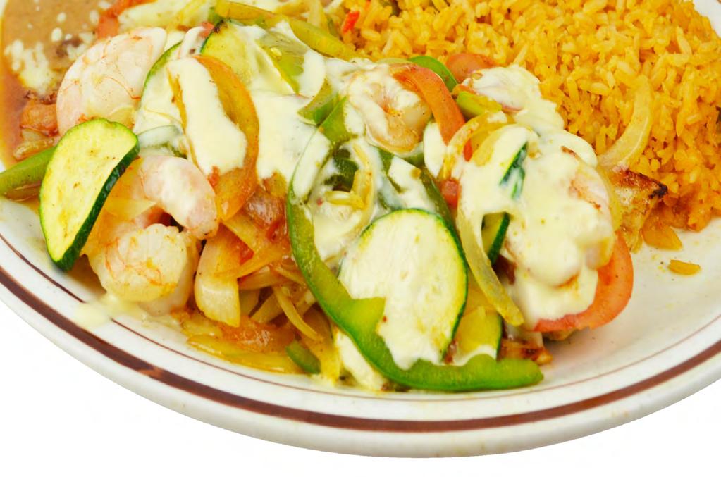 STEAK CHICKEN ORENTREES Molcajete Thin steak,chicken breast, shrimp,chorizo,cactus,banana peppers, onions pork chop our special sauce american white cheese cilantro served with rice and beans and