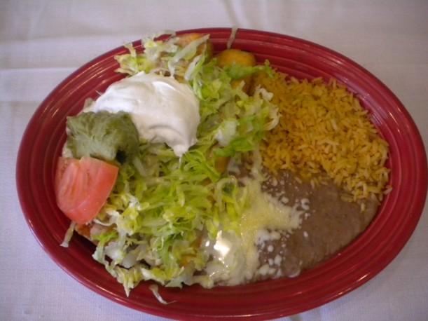 Served with guacamole, lettuce, tomatoes and sour cream. Chicken Degollado Special - 7.