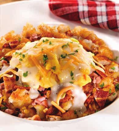 Meet the Smashers Served on a bed of crispy smashed tots and topped with two eggs. The Big Country* Diced ham, pork sausage and applewood smoked bacon topped with country gravy and Cheddar cheese. 9.
