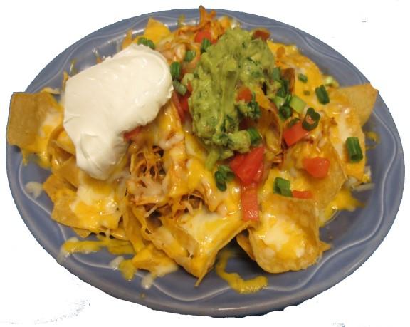 COMIENZOS Super Nachos Chips, cheese, beans, guacamole, sour cream, green onions and tomatoes. 8.49 (With beef, chicken or pork) 9.99 ( with carne asada) 12.49 Cheese Nachos 7.