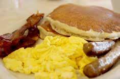 8.05 #1 - PANCAKE CLUB BREAKFAST* Small Juice, Two Buttermilk Pancakes, Two Eggs, Two Strips of Bacon or Two Sausage Links or Patties. 7.