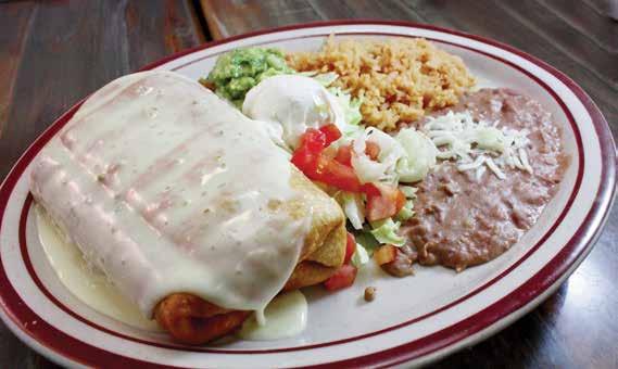 Served with rice, black beans, sour cream, lettuce, and tomatoes ENMOLADAS DE LA CASA Three chicken or beef enchiladas, topped with our homemade mole sauce, topped with sour cream, and garnished with