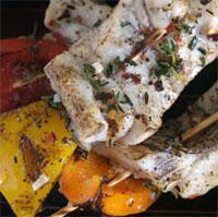 Grilled Barramundi Skewers Serves: 4 Prep Time: 8 Cook Time: 2 4 Barramundi Fillets 2 Bell Peppers- Red, Yellow or Green, as desired (cut into large chunks) ½ Cup Extra Virgin Olive Oil 1 Tbs.