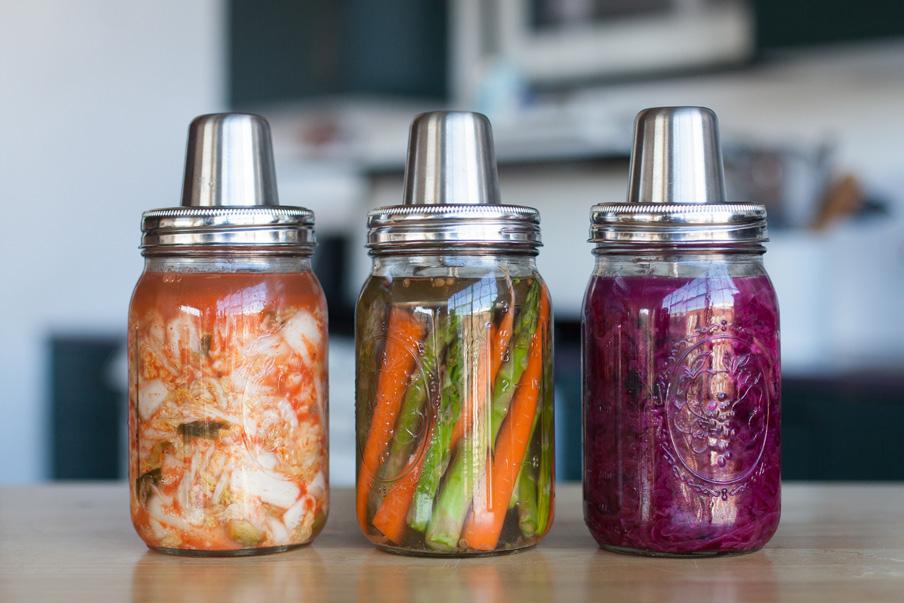 The Story ABOUT: Kraut Source is a stainless steel device that fits on any wide mouth mason jar making it simple to ferment foods in small batches.
