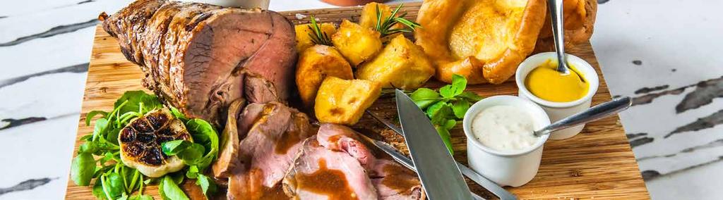 CARVING AT THE TABLE Devon Crispy Pork Loin, Apple and Rhubarb Sauce with Homemade Sage & Onion Stuffing West Country Topside of Beef with a Mustard & Thyme Crust, Yorkshire Pudding & Creamed