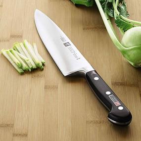 Chef s Knife Most versatile knife: Used for chopping,