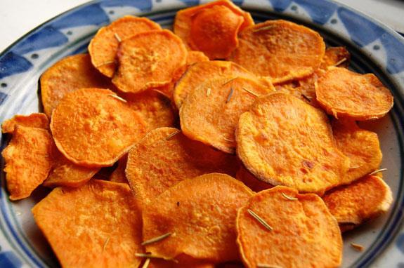 28 Sweet Potato Chips Cooking spray 1 (14-ounce) sweet potato, very thinly sliced, divided 1 teaspoon finely chopped fresh rosemary, divided 1/2 teaspoon salt, divided 1/4 teaspoon freshly ground