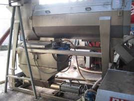 DHE Pump Transfer of the fermented pomace from the tank to the press using a
