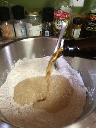 3 Tablespoons sugar 3 cups self rising flour (substitute 3 cups of all purpose flour, 3 teaspoons baking powder and 3/4 teaspoon salt) 1 bottle of beer Mix all ingredients together well in a bowl.