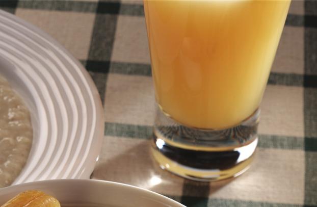 Breakfast Fruit Compote A medley soaked in Orange Fortijuce, combined with fresh orange juice.