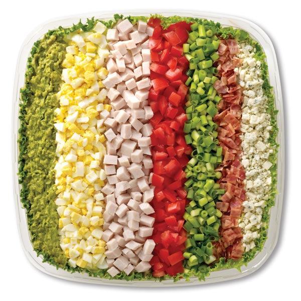 99 Cobb Salad Mixed greens with rows of your favorite toppings, including banana pepper, egg, bacon, green onion, tomato,