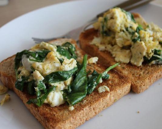 Spinach Scrambled Eggs 2 large eggs sea salt Freshly ground black pepper 1 teaspoon olive oil 3 cups baby spinach 1/2 teaspoon crushed red pepper flakes 1 slice of gluten free bread DIRECTIONS Whisk