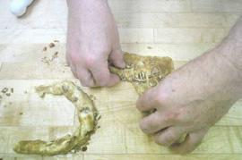 Step 5: Roll the crescent up starting at the cut point like you would a