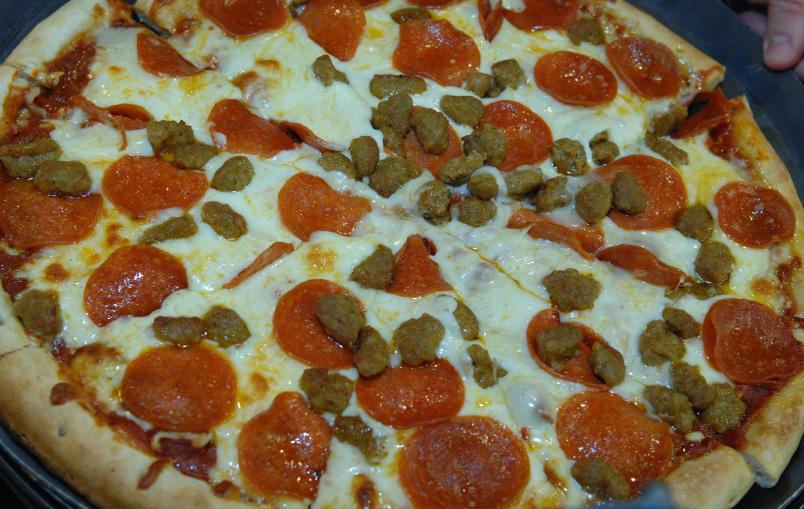Pizza includes Cost: 7.95 per person choice of tossed salad, Caesar salad or olive branch salad.