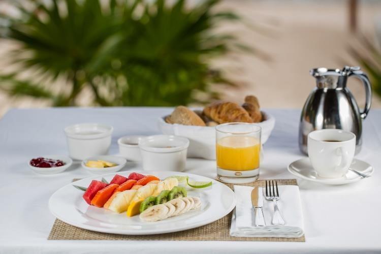 Healthy Breakfast -A basket of homemade croissants and selected bread with butter, wild flower honey and homemade tropical jam - Your choice of coffee, milk, tea, or hot chocolate.