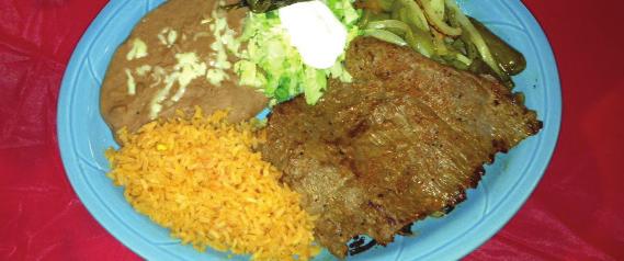 breast laid on the bed of mixed vegetables, topped with chorizo and melted cheese, served with rice, beans, lettuce, sour and pico-de-gallo Fish Jalisco Camarones a la Diabla Camarones al Mojo de Ajo