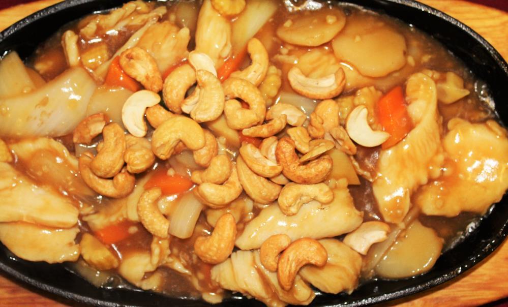 Cashew Nut Dishes A Savoury dish made with a fresh Cashew Nuts, Stir fried with Sliced Onions, Carrots and Water Chestnuts. Stir Fried King Prawns with Cashew Nuts... 12.
