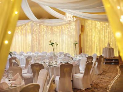Backdrops and Draping Standard fairy light backdrop for your wedding ceremony Full wall drape with fairy lights on the back wall Full