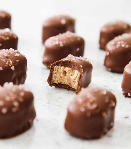 peanuts enrobed in either creamy milk or dark chocolate made from 100%