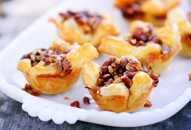 Apple Brie Bites Makes 24 servings 1 sheet puff pastry, thawed 5 oz Brie cheese 1/2 cup MUSSELMAN S Apple Butter 1/4 cup pecans, chopped Recipe created by The Gunny Sack 1. Preheat oven to 400oF.