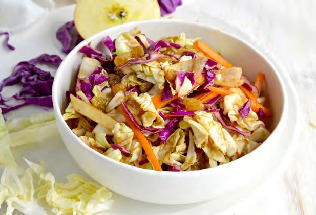 Makes 8 servings 4 cups green cabbage, shredded 2 cups purple cabbage, shredded ½ cup carrots, cut into matchsticks 1 Fuji apple, thinly sliced ½ cup golden raisins 1/2 cup almonds, sliced ½ cup