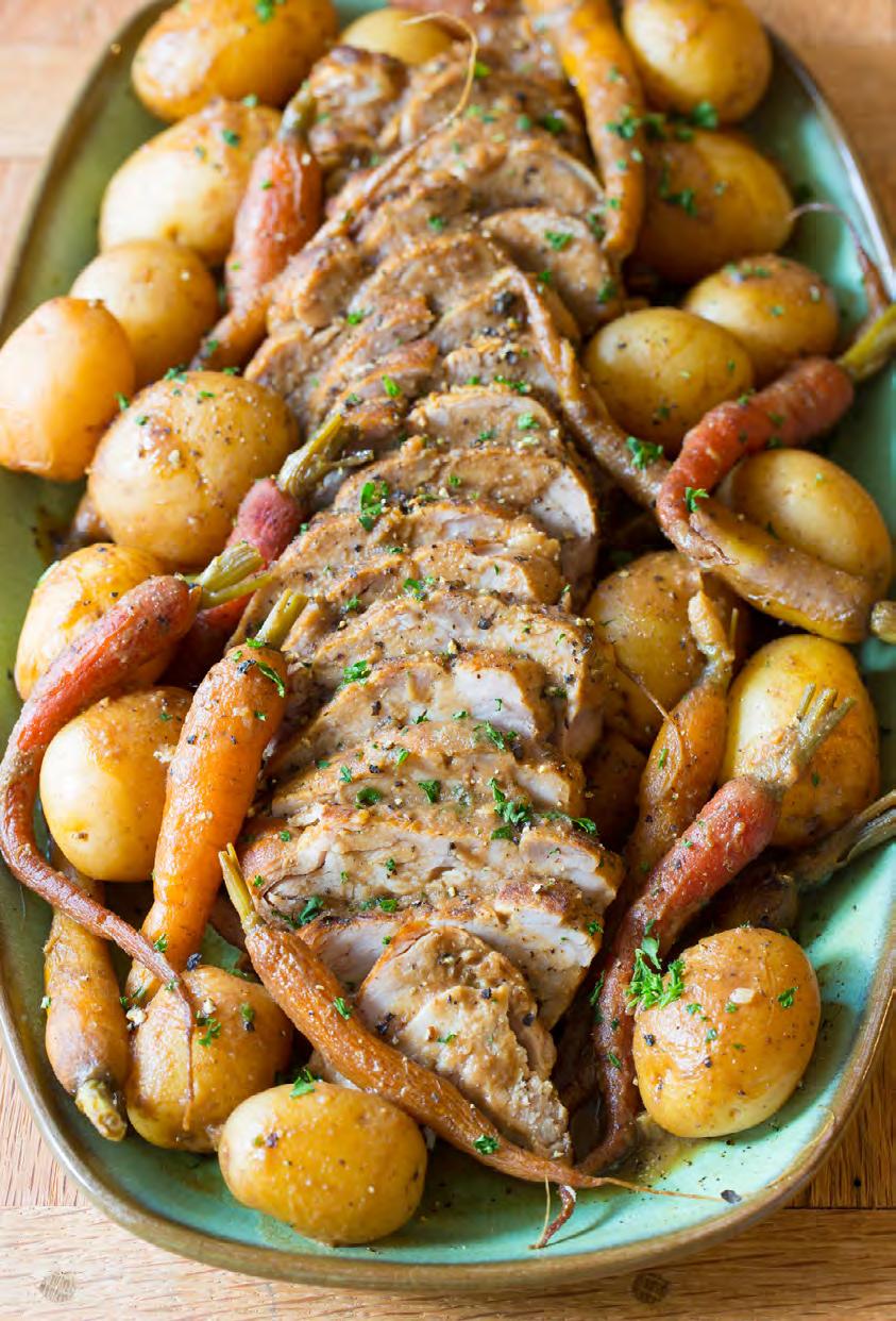 Makes 6 servings 2 pounds pork loin Salt and pepper 1 large red onion, peeled and cut into large chunks 1 1/2 pounds baby potatoes 1 pound baby carrots 4 garlic cloves, minced 1 cup MUSSELMAN S Apple