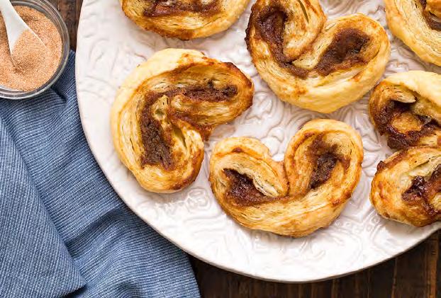 Apple Butter Palmiers Makes 20 servings 2 sheets puff pastry, thawed 1/2 cup MUSSELMAN S Apple Butter 1/2 cup sugar 2 teaspoons ground cinnamon Recipe created by Chocolate Moosey 1.