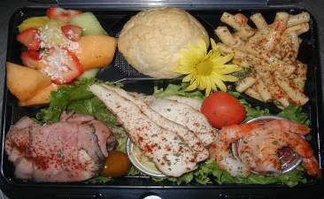 LUNCH BOX LUNCHES Our Box Lunches come in a 4-compartment black bottom box with a clear lid. They are beautifully garnished and have a fresh flower accent. Sandwich Box Lunch $9.