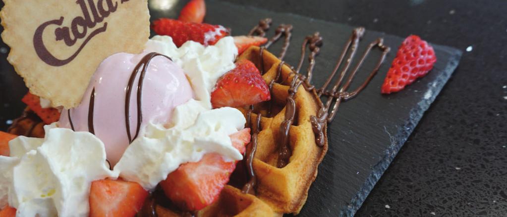 95 & STRAWBERRY White chocolate sauce drizzled over a hot waffle topped with vanilla ice cream, garnished with a chopped strawberries, whipped cream and a Crolla s wafer. COOKIES & CREAM / 5.