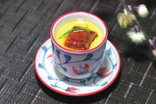 teacup (chawan) over which a mixture of broth and